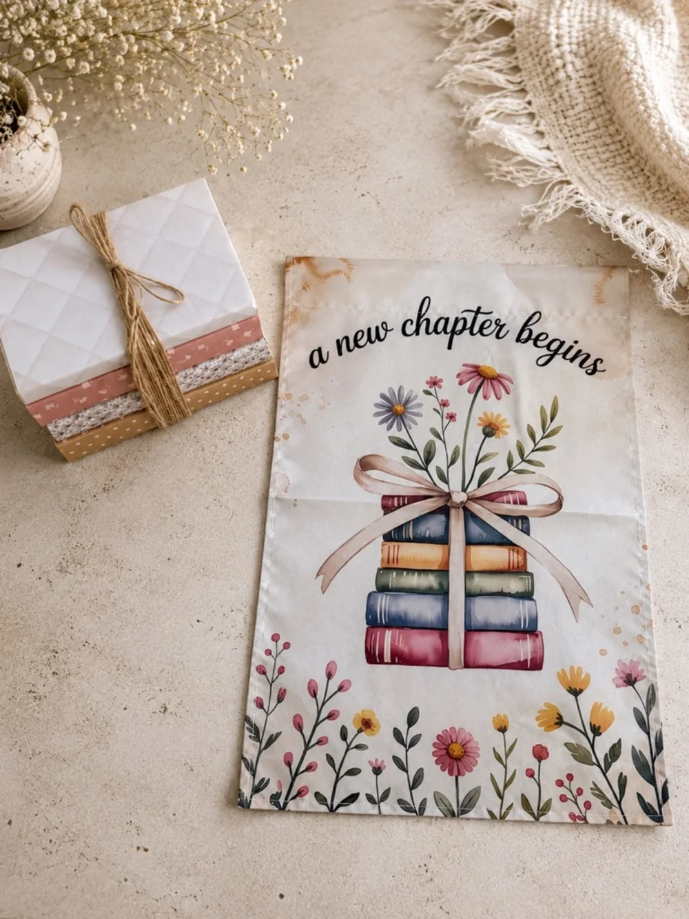 A New Chapter Begins Book Stack & Garden Flag Double Sided 18” x 12”